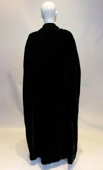 A Vintage 1960s Marshall and Snellgrove Black Silk Velvet Cape