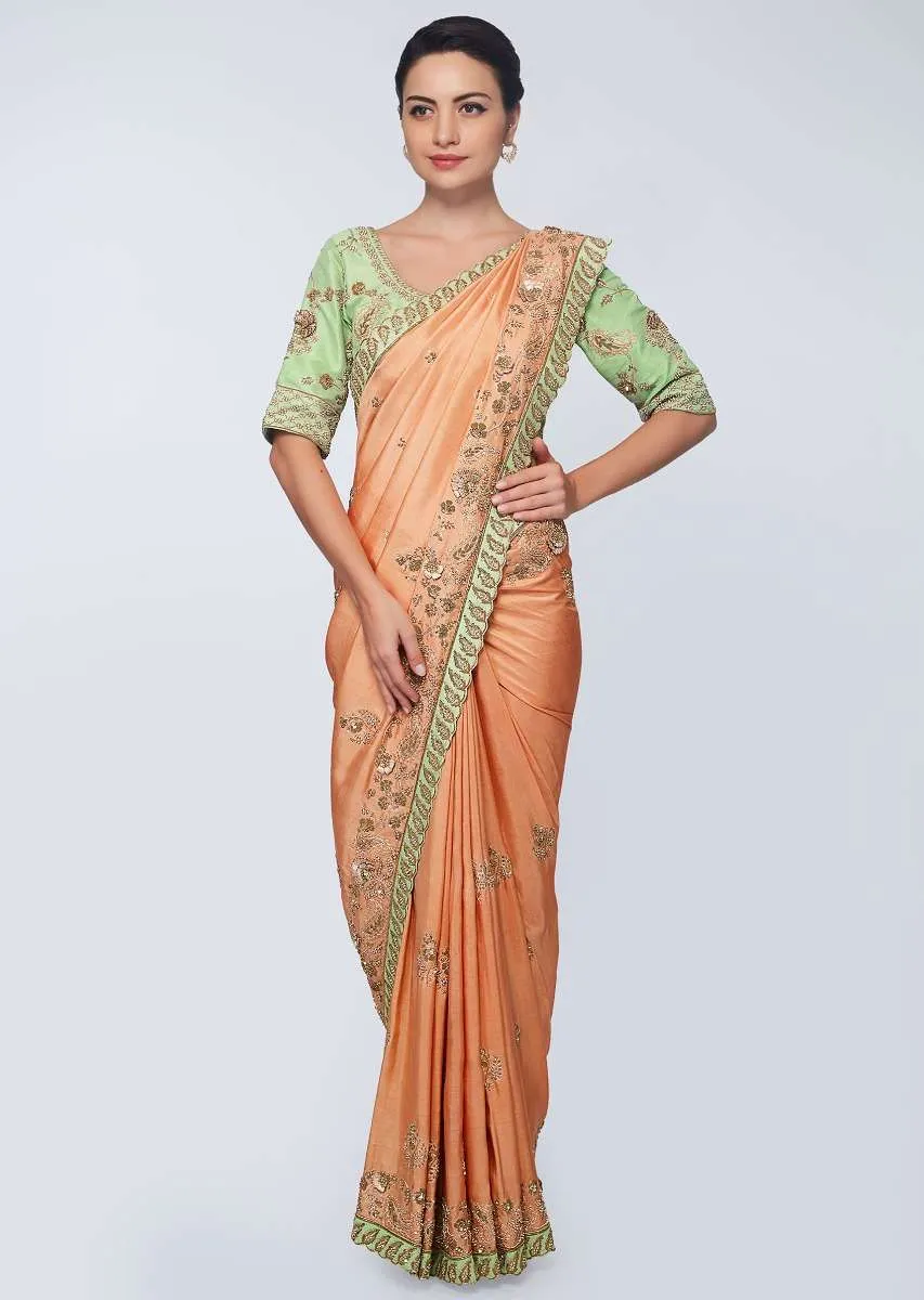 Cream beige cotton silk saree in with embroidered butti and border  in floral and paisley motif only on Kalki