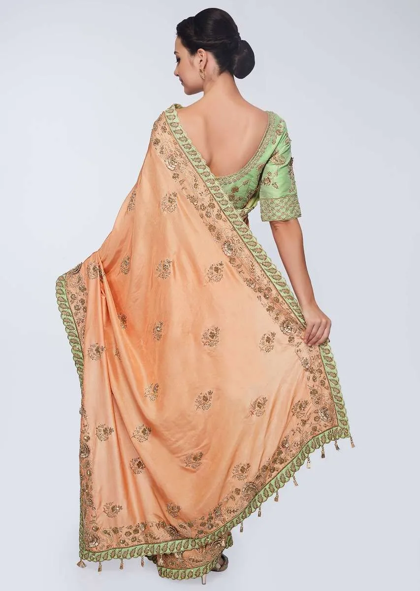 Cream beige cotton silk saree in with embroidered butti and border  in floral and paisley motif only on Kalki