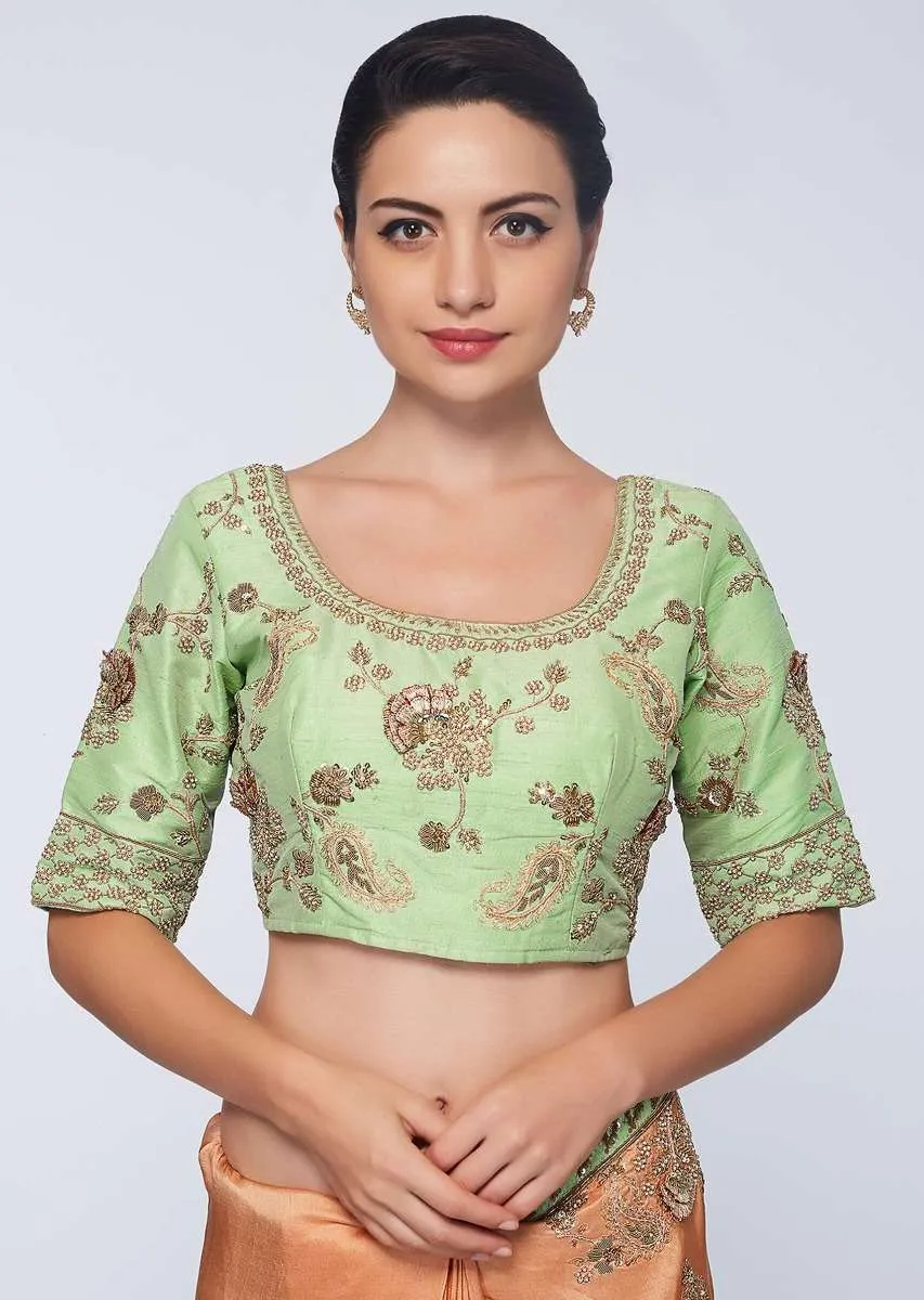 Cream beige cotton silk saree in with embroidered butti and border  in floral and paisley motif only on Kalki