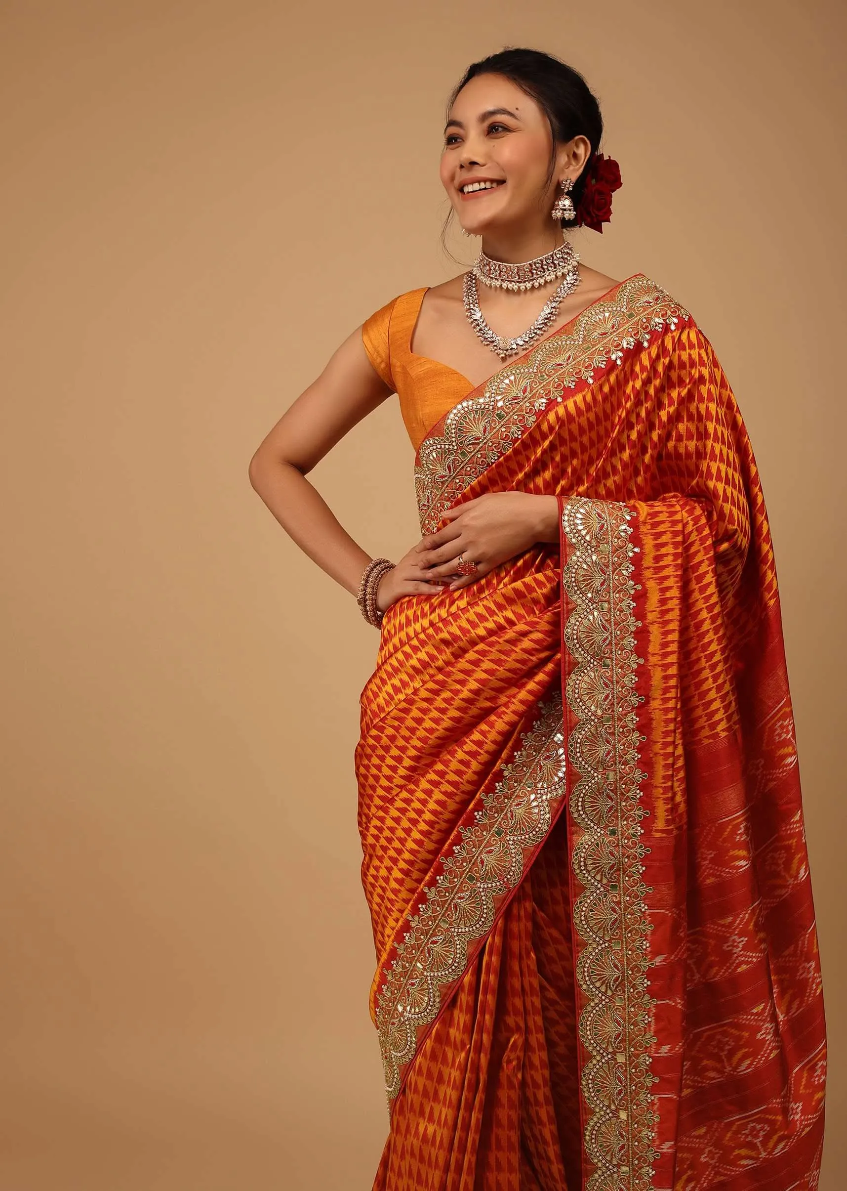 Fire Orange Saree In Pure Silk With Handloom Patola Weave And Ikat Embroidery
