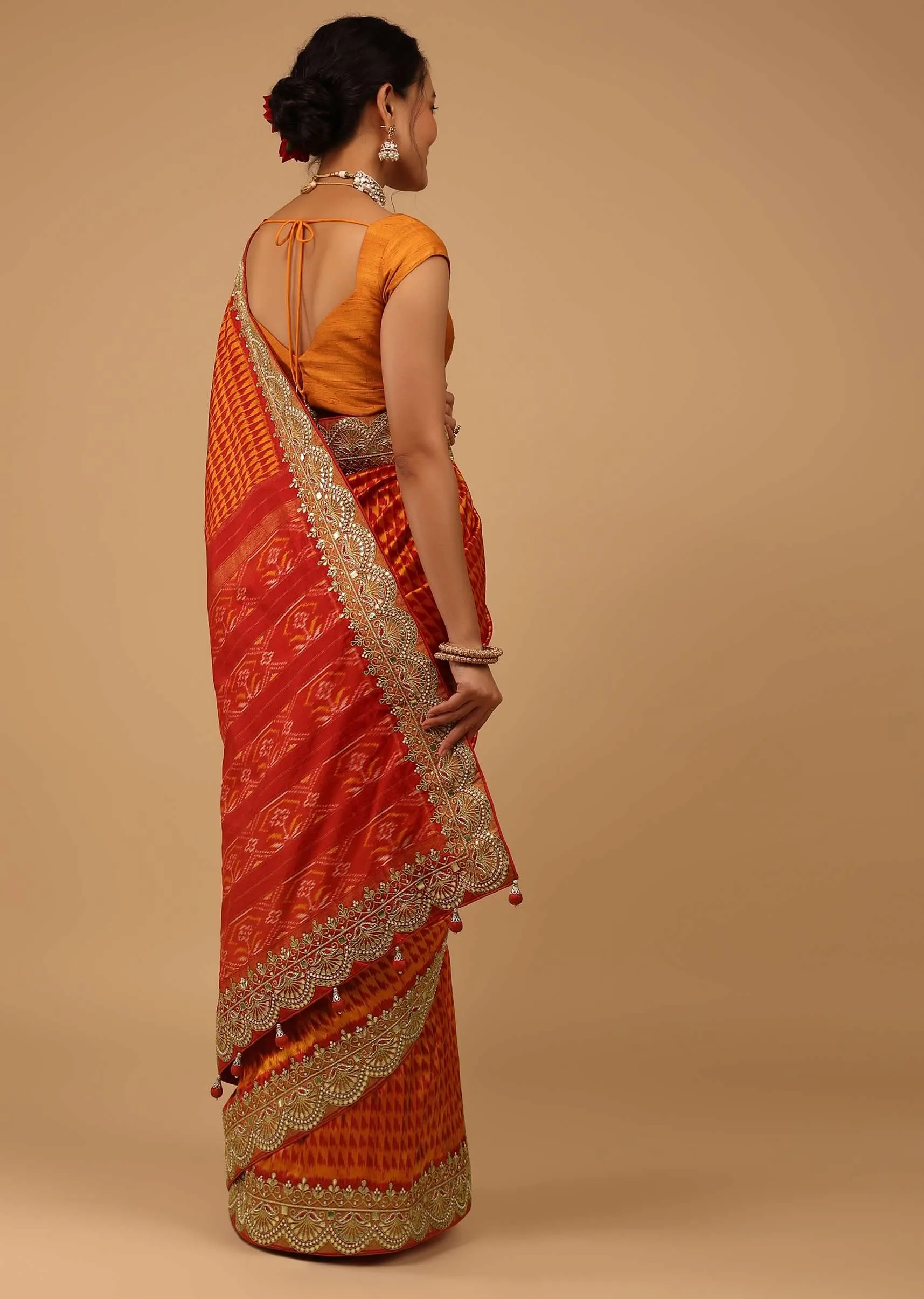 Fire Orange Saree In Pure Silk With Handloom Patola Weave And Ikat Embroidery