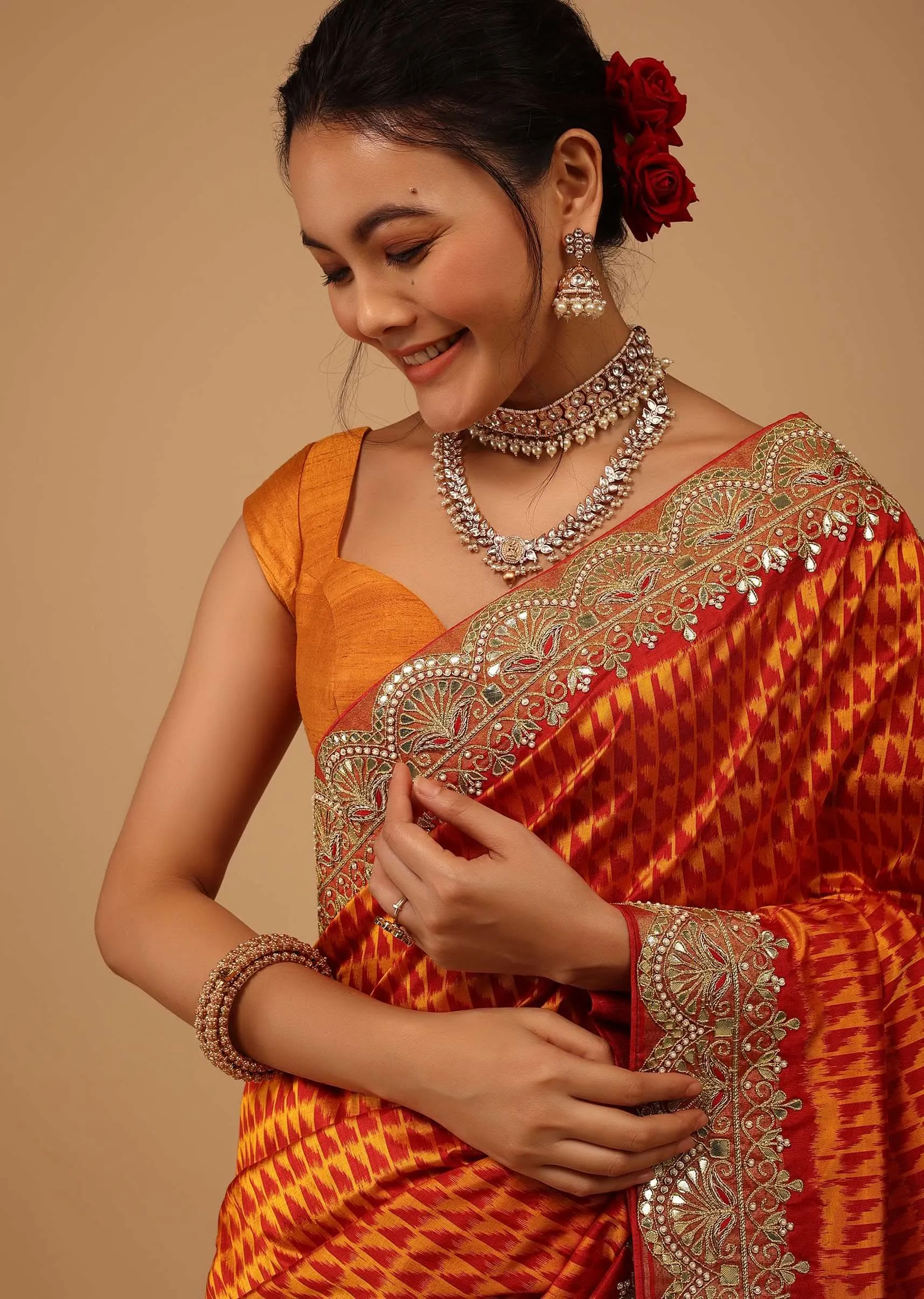 Fire Orange Saree In Pure Silk With Handloom Patola Weave And Ikat Embroidery