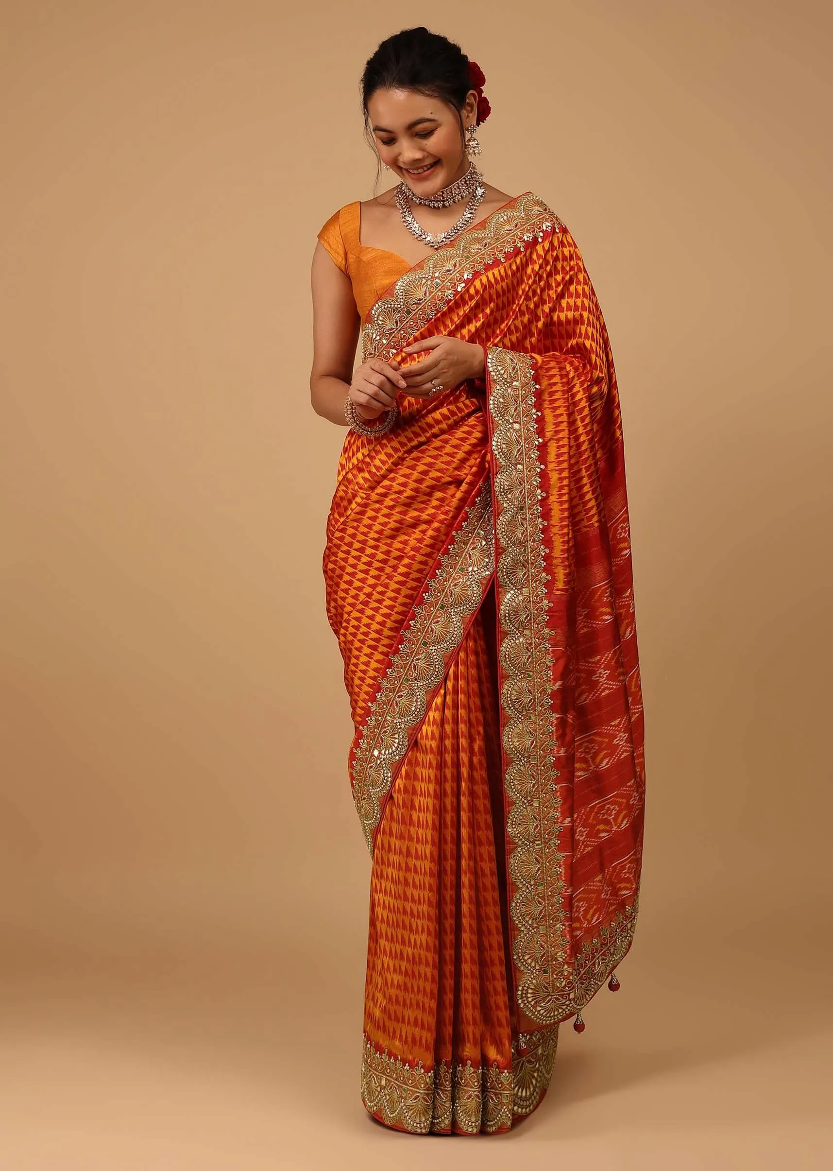 Fire Orange Saree In Pure Silk With Handloom Patola Weave And Ikat Embroidery