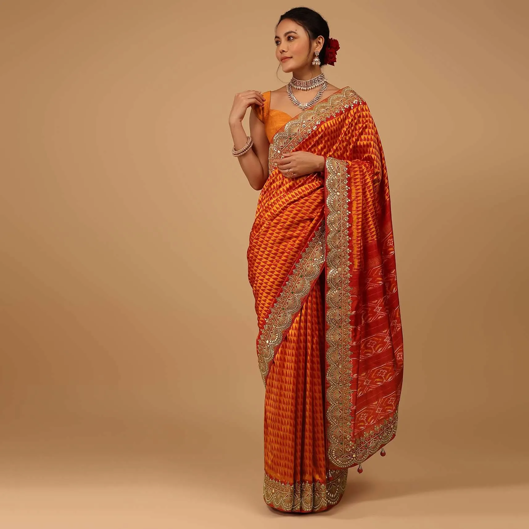 Fire Orange Saree In Pure Silk With Handloom Patola Weave And Ikat Embroidery