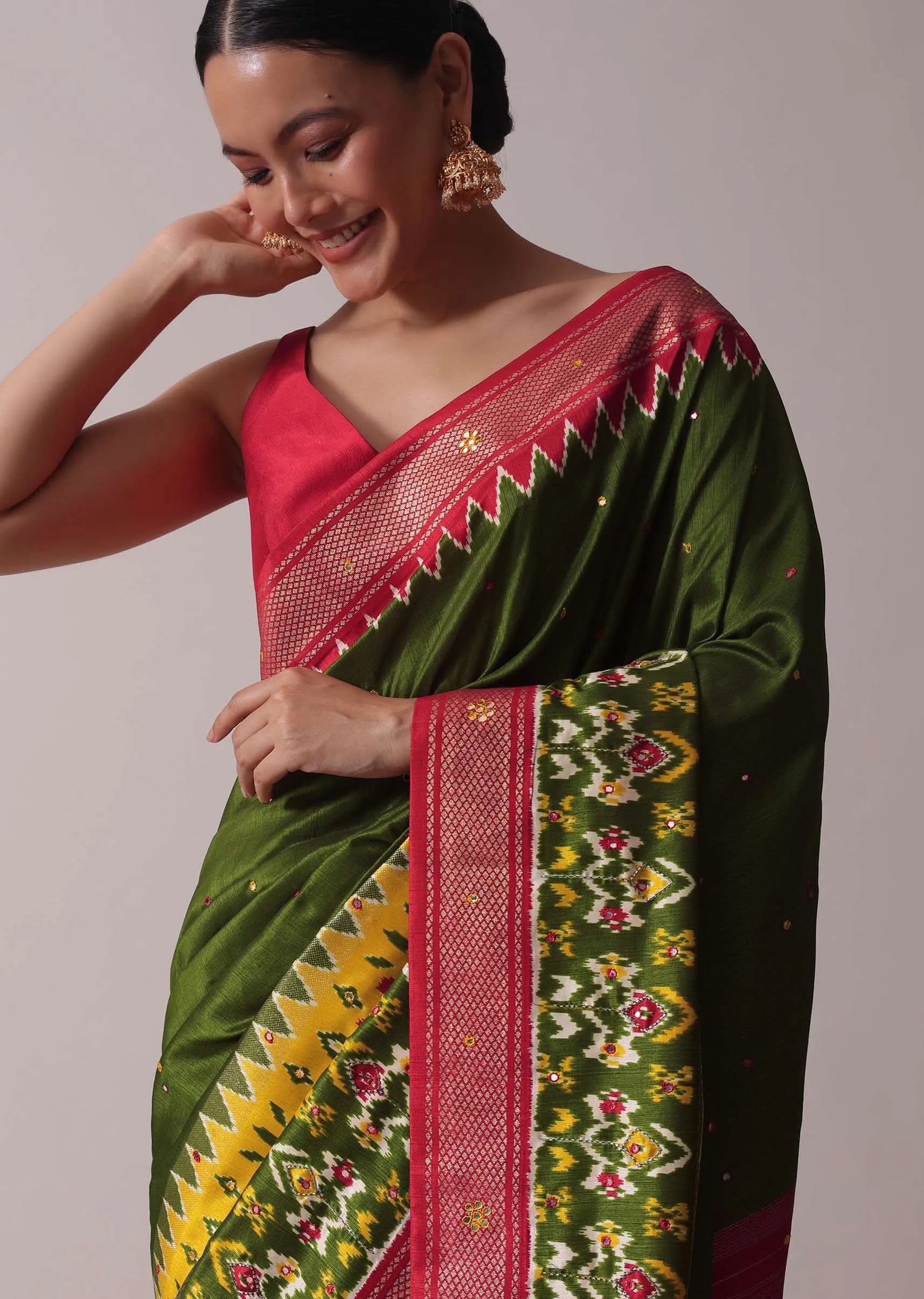 Green Patola Printed Embroidered Festive Saree In Dola Silk